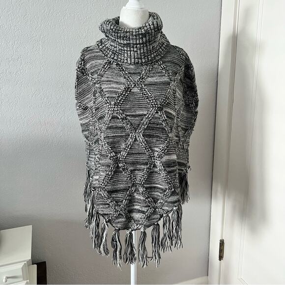 Pia Rossini Sweaters - Pia Rossini Marled Knit Fringe Poncho